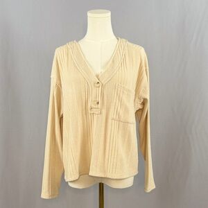 LUSH Cozy, comfy, and effortlessly stylish neutral ribbed knit Henley